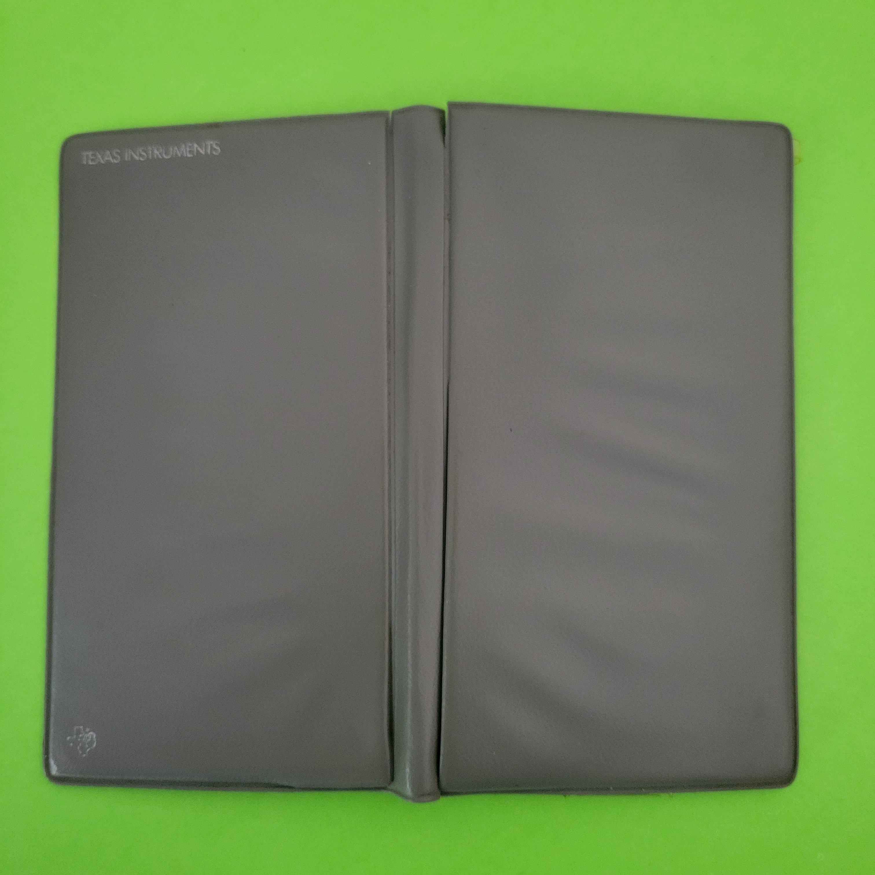An image of the case of a texas instruments ti30iii scientific/engineering calculator